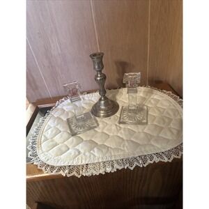collection of vintage-style candlesticks.‎